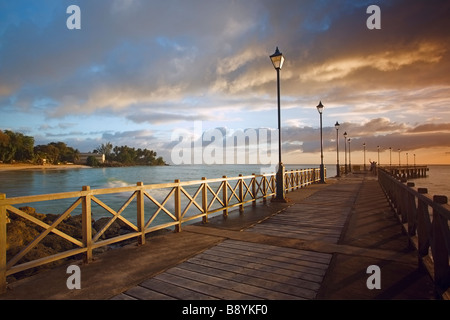 Sunset at Speightstown or 'Little Bristol' pier, second largest town in Barbados Stock Photo