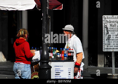 Drink pedlar, Decatur Street, New Orleans, Louisiana, United States of America, North America Stock Photo