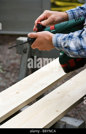 A man doing carpentry Sweden. Stock Photo