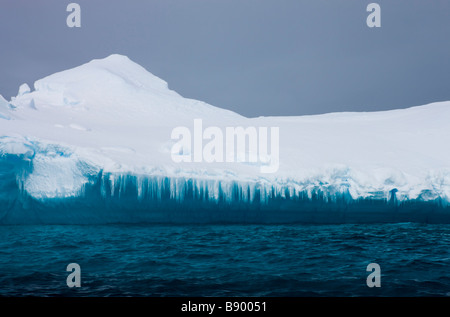 Melting facade of an iceberg Antarctic Peninsula Antarctica Stock Photo