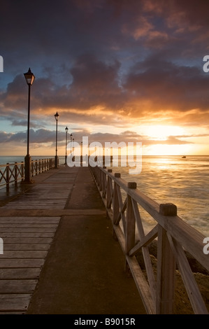 Sunset at Speightstown or 'Little Bristol' pier, second largest town in Barbados Stock Photo