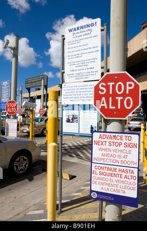 Multi language signs at the U S port of entry at the Tijuana Baja California Mexico San Diego California border Stock Photo