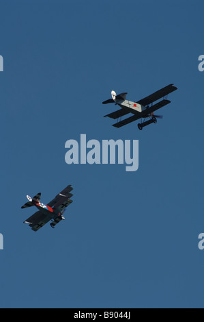 Simulated dogfight between Fokker triplane and biplane at historic Rhinebeck Aerodrome, Hudson Valley Stock Photo
