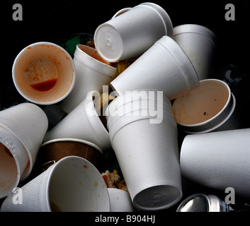 digarded polystyrene drinking cups in rubbish bin Stock Photo