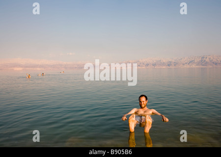 Male tourist floating in Dead Sea, portrait, Israel, Middle East Stock Photo