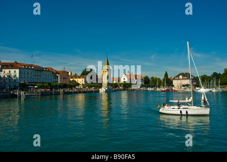 Yacht at Lindau harbor, Lake Constance, Bavaria, Germany | Segelyacht im Hafen von Lindau, Bodensee, Bayern, Deutschland Stock Photo