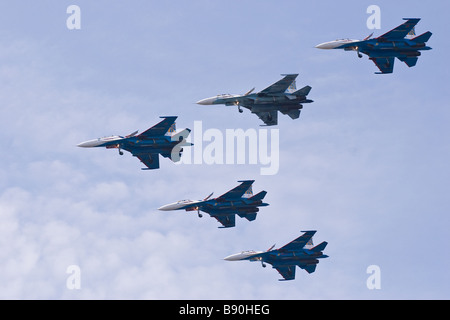 The Russian Knights aerobatic team at air show Stock Photo