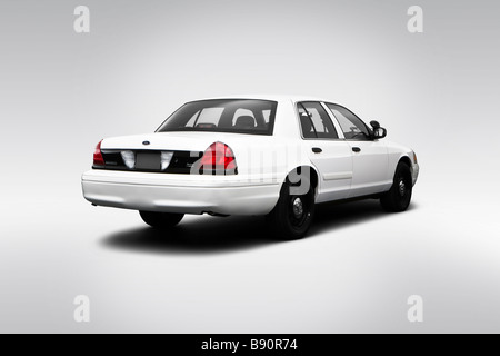 2009 Ford Crown Victoria POLICE INTERCEPTOR in White - Rear angle view Stock Photo