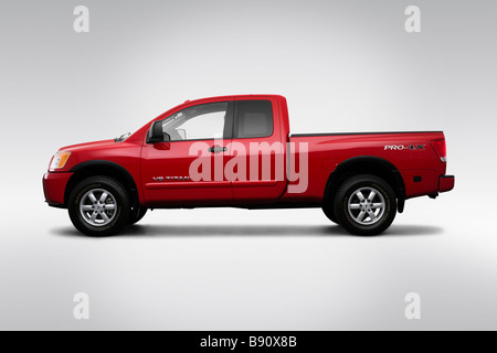 2009 Nissan Titan PRO-4X in Red - Rear angle view Stock Photo - Alamy