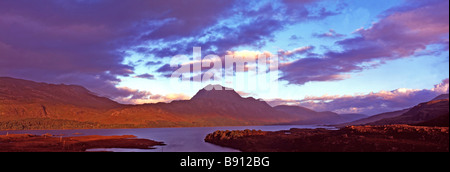 A stunning early evening sunset over Loch Maree in the Highlands of Scotland Stock Photo