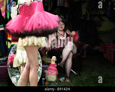 Festivalgoer at a stall during The Secret Garden Party festival, UK Stock Photo