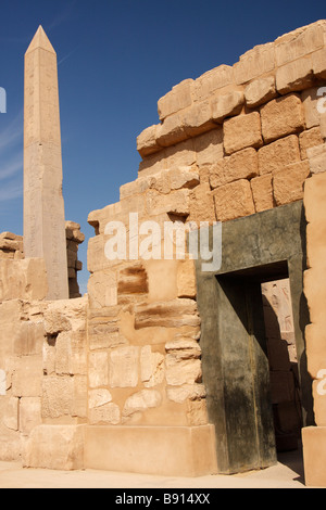 Ancient stone doorway and granite obelisk of Queen Hatshepsut, Karnak Temple complex ruins, Luxor, Egypt Stock Photo