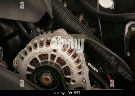 Delphi automotive alternator installed on new engine Stock Photo