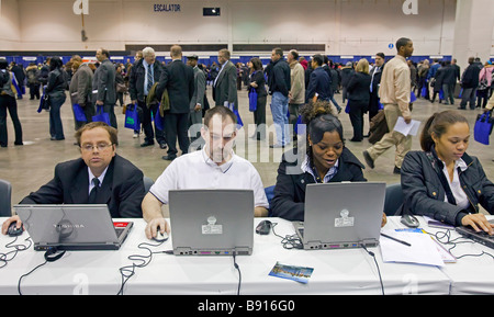 Unemployed People Look for Work at Job Fair Stock Photo