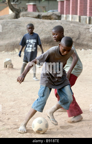 Nigeria: young boys play football, soccer Stock Photo