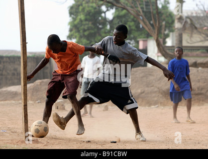 Nigeria: young boys play football, soccer Stock Photo