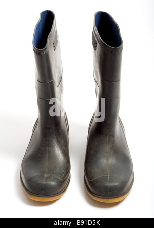 Old pair of wellington boots on white background Stock Photo - Alamy