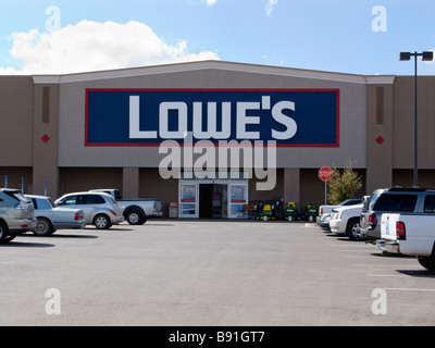 Lowe's Home Improvement store with outdoor display of lawn tractors and ...