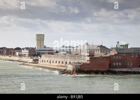 The Fortified Entrance to Portsmouth Harbour, with Warning Signs with the Submarine Escape Training Tank in the distance. Stock Photo
