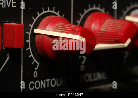 Macro shot of control knobs on a guitar amp Stock Photo