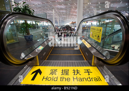Detail of escalator at new Terminal 3 at Beijing Airport China Stock Photo