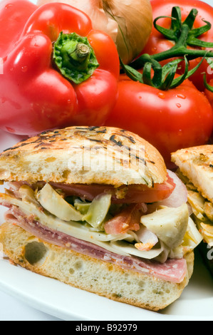 gourmet hot ham sandwich rosemary bread with variety of ham and italian salami Stock Photo