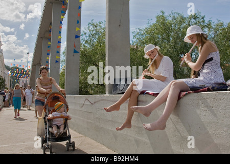 Two Girls Playing Instrument, Tartu Hanseatic Days 2008, Estonia, Europe Stock Photo