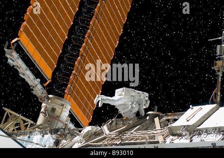 NASA astronaut working on solar panels for International Space Station Stock Photo