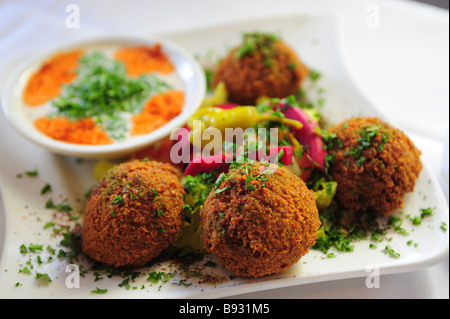 Falafel and tahini dipping sauce Middle East foods Stock Photo