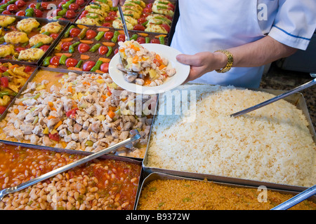 Turkish food being served in Istanbul restaurant on the plate is a chicken based dish Istanbul Turkey Stock Photo