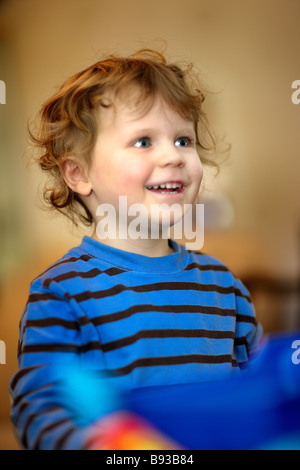 Three year old boy pleased with himself. Stock Photo