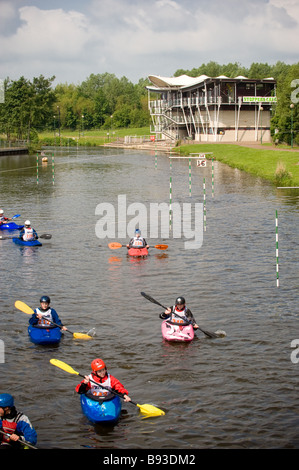 Group of Kayakers on the water training at Tees Barrage International White Water Centre. UK Stock Photo