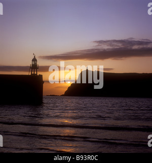 Sunset seen from Port Erin with view showing Milner's Tower on Bradda Head Stock Photo