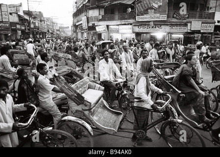 A traffic jam of bikes and rickshaws in Varanasi, India Stock Photo