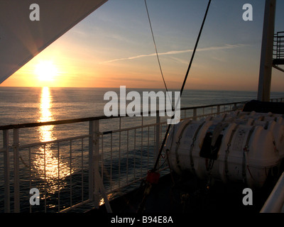 Sunset off the port side of the Oscar Wilde Ferry as she sails for Roskoff Stock Photo