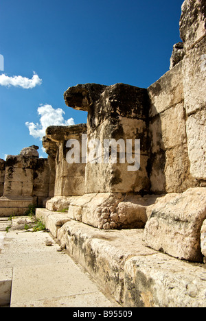 Earthquake toppled remains of building ruins debris in archaeological excavation site at Bet She an Stock Photo