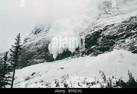 FRANCE French Alps Trois VallŽes Avalanche of snow crashing down steep mountainside. Stock Photo