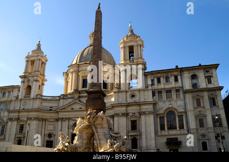 The church of St Agnes in Agone and the Central Fountain by Bernini in the Piazza Navona in Rome Italy Stock Photo