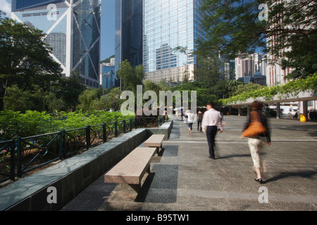Office Workers Walking Through Chater Garden, Central, Hong Kong Stock Photo