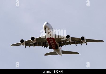 Emirates Airways new Airbus A380 long haul passenger aircraft prepares to land at London's Heathrow Airport Stock Photo