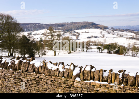 Winter snow on the Cotswolds - Haresfield Hill viewed from Edge, Gloucestershire Stock Photo