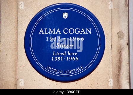 blue plaque marking a former home of singer alma cogan, in kensington high street, west london, england Stock Photo