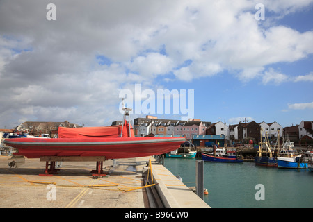 A rigid inflatable boat on the dockside in Old Portsmouth Stock Photo