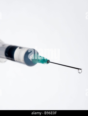 A medical Syringe and hypodermic needle on white background Stock Photo