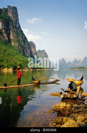 Li River cormorant fishermen on bamboo rafts near Xingping (Guilin area) Stock Photo