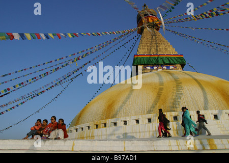 People enjoy Boudhanath Stupa in Kathmandu, Nepal. Stock Photo