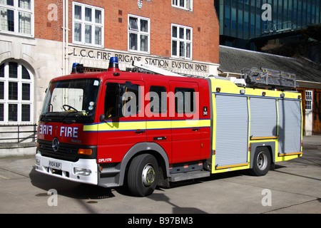 A fire tender sitting in the front yard of the Euston Road Fire station in London.  March 2009 Stock Photo