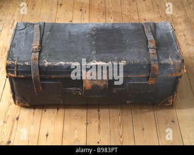 Old battered luggage trunk. Stock Photo