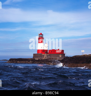 Waves in front of Longstone Lighthouse, Farne Islands, Northumberland, England, UK Stock Photo