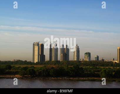 Skyscrapers from Puerto Madero neighborhood, in Buenos Aires, behind the Buenos Aires Ecological Reserve viewed from the river. Stock Photo